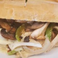 Classic Chicken Cheesesteak · Sliced chicken with melted provolone on a hoagie roll.