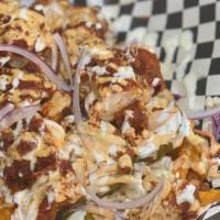 Loaded Fries · Waffle Fries, Chicken, Cole Slaw, Pickle, Onion, Chubby Sauce