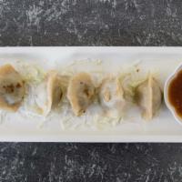 Pot Stickers - Chicken · Pan fried dumpling stuffed with minced chicken and spinach. Serve w/ homemade tamarind dippi...