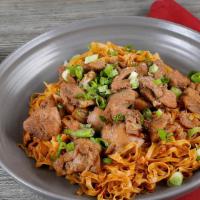 Burmese Garlic Noodle Chicken · Flat Egg noodles tossed with garlic oil, soy sauce and crispy garlic. Top with Braised Chick...