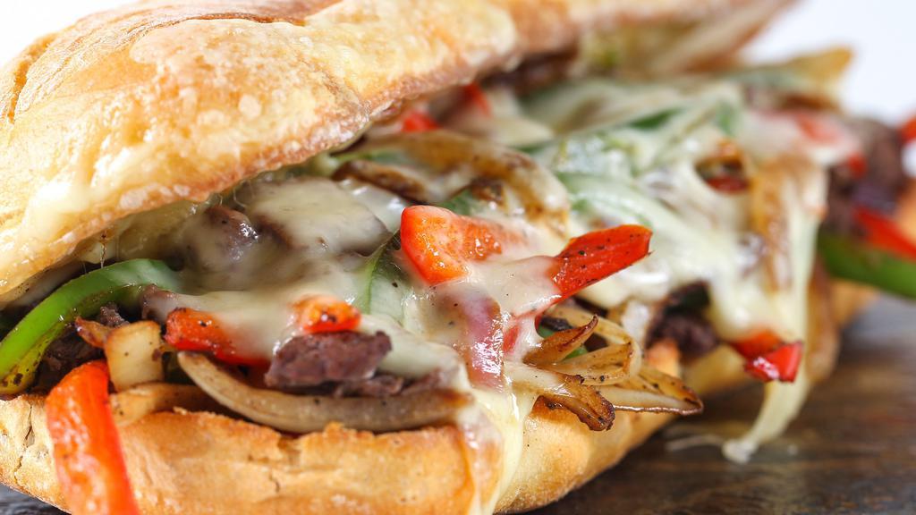 Roasted Pepper Philly Steak · Roasted Pepper Philly Steak sandwich, fresh grilled onions, bell peppers, and your choice of cheese.