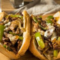 Wild Philly Steak · Wild Philly Steak Sandwich, mixed with bell peppers, onions topped with sheltered cheese.