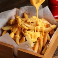 Cheese Fries · Crispy french fries drizzled with yummy cheese sauce.
