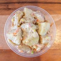 Potato Salad · Red potatoes, mayonnaise, celery, red onions, shredded carrots, brown mustard, Worcestershir...