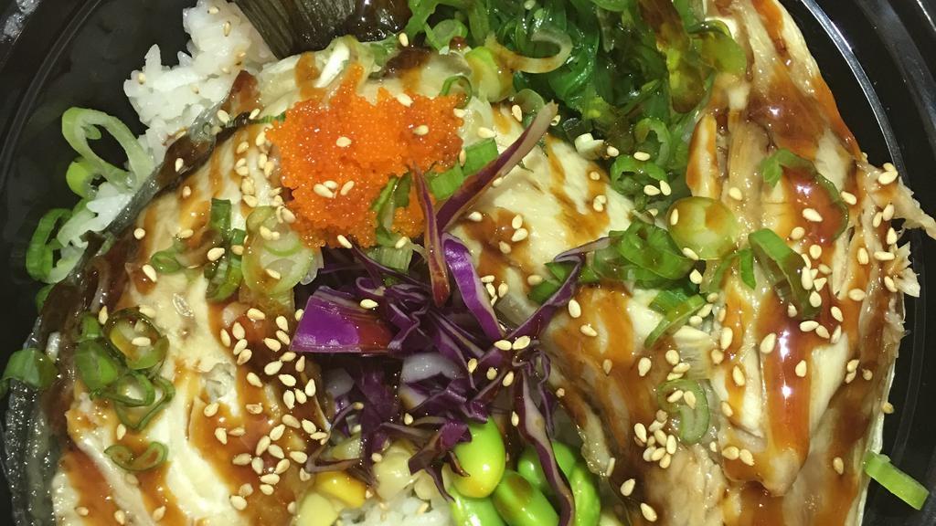 Hamachi Kama bowl · Cooked yellowtail fish neck , seaweed salad,cucumber,corn bean cabbage, green onion, unagi sauce