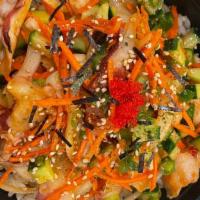 Tako poke bowl  · Slice the Tako mix with seaweed salad,cabbage cucumber, carrot ,jalapeño, cilantro,white oni...