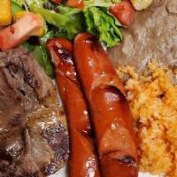 Alambre · Bacon, link, grilled beef, mozzarella cheese, bell peppers, onions, rice, beans and corn tor...