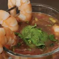 Coctel De Camarones · Shrimps, pico de gallo, avocado, onions, clamato, house salsa and salted crackers.
