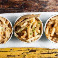 Garlic Tossed Fries · W/ fresh chopped parsley