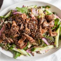 Japanese Steak Salad · Sirloin steak, cilantro, cabbage, sesame seed, radish, carrot, ginger sesame dressing