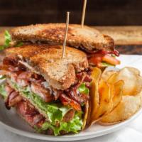 BLT  Sandwich · Applewood bacon, lettuce, tomato, served with chips, add avocado for additional charge.