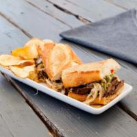 Cheese Steak Sandwich · Served on baguette with sautéed mushroom, bell pepper, onion and fontina cheese