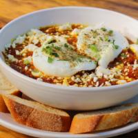 Slow-Cooked Tomato & Egg · Homemade slow-cooked tomato, sautéed onion, two soft-boiled organic eggs, fontina cheese and...
