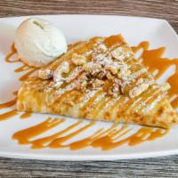 Cinnamon Apple French Toast · Cooked apples in cinnamon maple sauce, walnuts, caramel, powdered sugar. Served with french ...