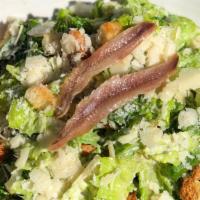 Caesar Salad · Our loved Roman lettuce, shaved salty parmigiano Reggiano, our homemade bread transformed in...