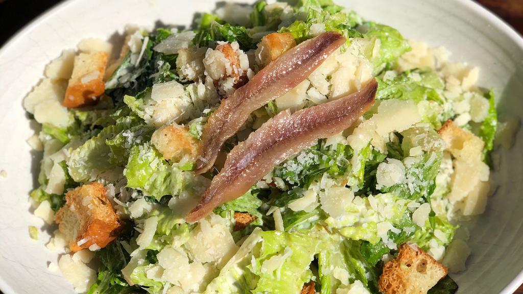 Caesar Salad · Our loved Roman lettuce, shaved salty parmigiano Reggiano, our homemade bread transformed in crispy croutons all topped with our homemade (and perfectionated)  creamy Caesar dressing.