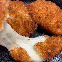 Mozzarella in Carrozza · Serving of 4 breaded and crunchy out side, melted and juicy buffalo mozzarella inside served...