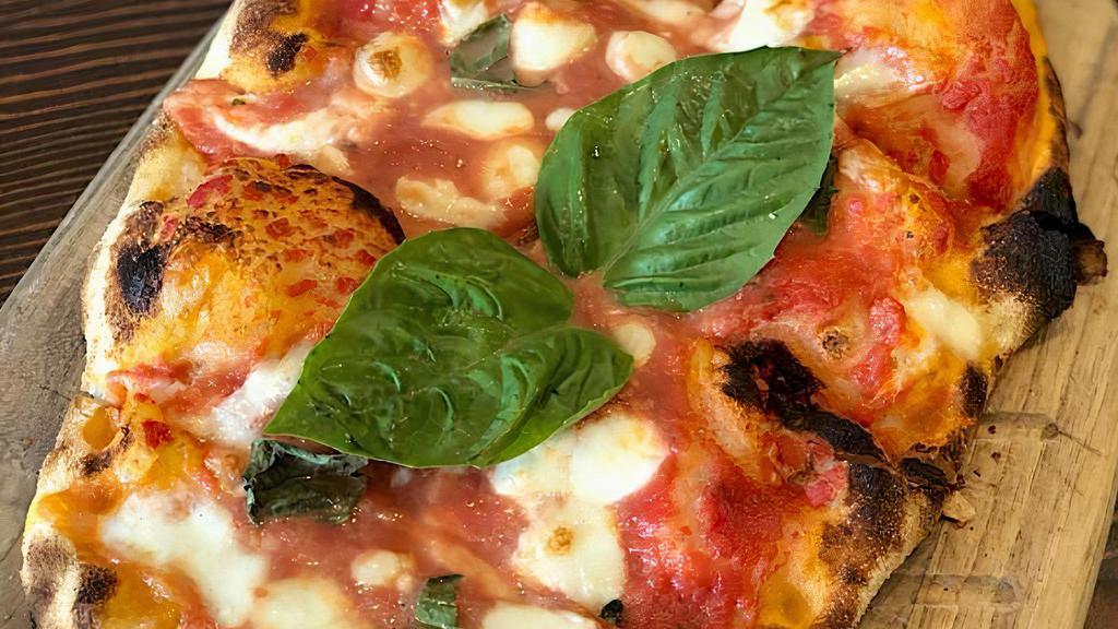 Margherita Pizza · San Marzano tomato sauce, mozzarella cheese and basil (Vegetarian)