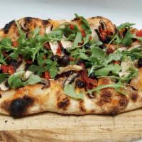 Vegana Pizza · Tomato sauce base, sliced mushrooms, juicy sundried tomatoes and fresh crunchy arugula. Heal...