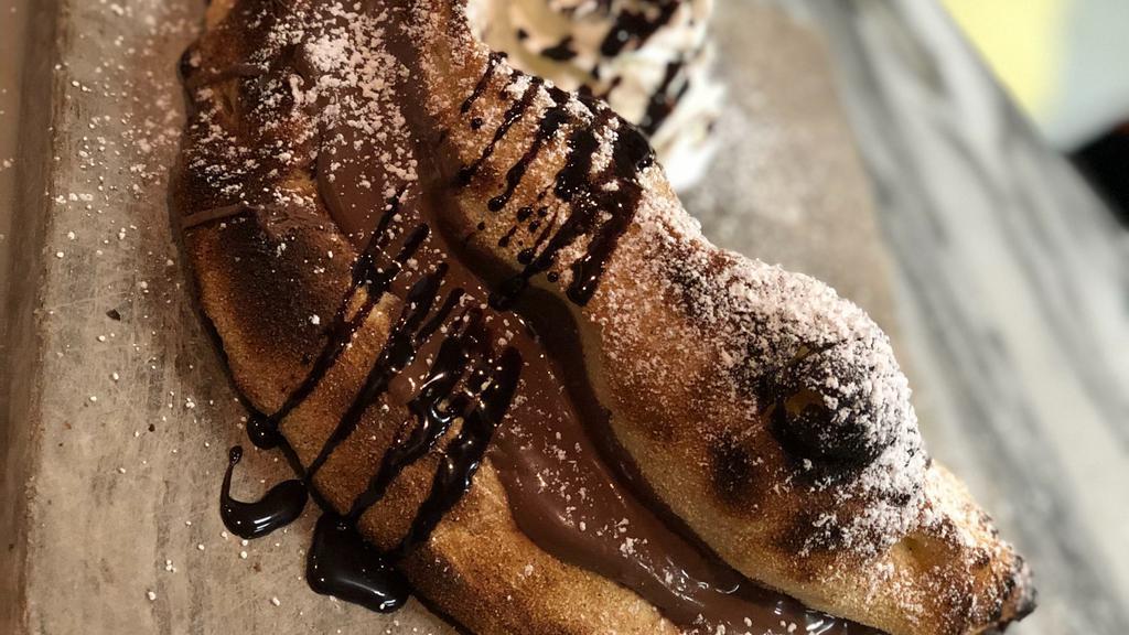 Nutella pizza · Warm salty pinsa topped with creamy Nutella
