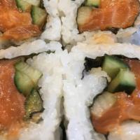 17. Spicy Salmon Roll · Fresh Salmon sashimi, seasoned special hot sauce, cool slice cucumber eight pieces.