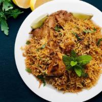 FB's Kodi (Chicken) Biryani · Spicy basmati rice cooked in biryani spices herbs and juicy chicken leg pieces.