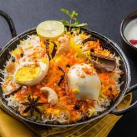 FB's Guddu (Egg) Biryani · Fragrant rice cooked with aromatic biryani spices, herbs and boiled eggs