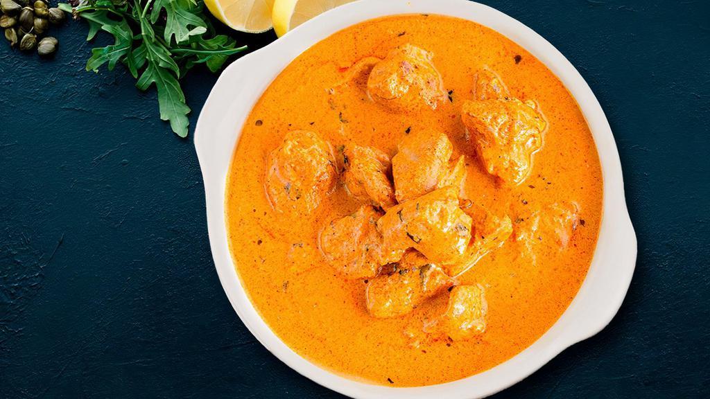 Creamy Butter Chicken Curry · Chunks of grilled chicken cooked in smooth buttery and creamy tomato based gravy