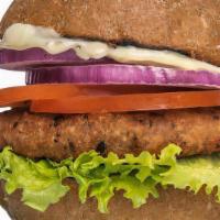 Cracked Mayo Burger · Crispy GMO-free soy patty, accompanied by garden fresh lettuce, red onion, tomato and slathe...