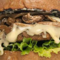 Creamy Shrooms Burger · Crispy GMO-free soy patty on a bed of fresh lettuce, smothered with super creamy sauteed mus...