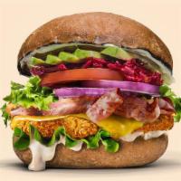 Avocado Beetroot Burger (Deluxe) · With added vegan cheese and vegan bacon, this colourful bunch is handmade with fresh avocado...
