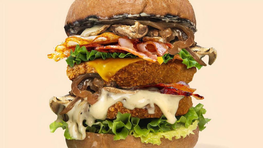 Creamy Shrooms Burger (Ultimate) · Double crispy yet juicy GMO free soy patties with added vegan cheese, vegan bacon and vegan egg on a bed of fresh lettuce, smothered with creamy sautéed mushrooms sauce, topped with caramelised onion.