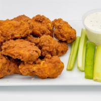 Breaded Wings (12) · Lightly breaded with a spicy kick! Comes with one sauce, one dip & celery.