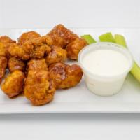Boneless Wings (12 Pieces) · Juicy boneless chicken served with your favorite sauce, one dip and celery.