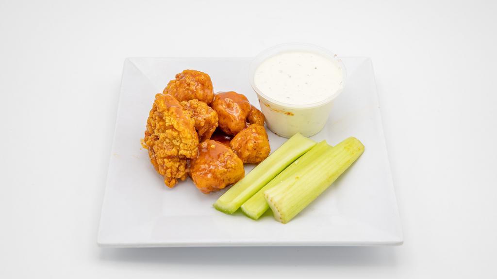 Boneless Wings (6 Pieces) · Wingin' It favorite: Juicy boneless chicken served with your favorite sauce, one dip and celery.