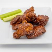 Breaded Wings (6) · Lightly breaded with a spicy kick! Comes with one sauce, one dip & celery.
