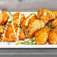 Wings · Chicken wings marinated in Indian spices.