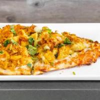 Tikka Masala · Tikka sauce, cheese, onions, bell peppers, tomatoes, choice of meat, cilantro, and green oni...