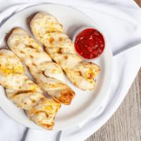 Garlic Parmesan Twists (Three Twists) · Rolled fresh daily and baked to perfection with fresh garlic, three-cheese blend and parmesa...
