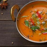 Rasam* · Traditional South Indian soup made with tamarind base.