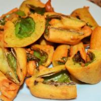 Cut Mirchi* · South Indian street delicacy made with Jalapeno coated with besan flour blended with traditi...