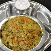 Veg Biriyani* · Classic South Indian preparation made of long grain basmati rice, mixed vegetables & traditi...