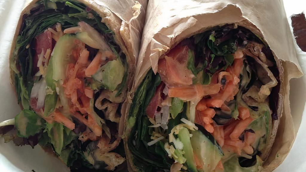 Garden Veggie Wrap · Tortilla, hummus or guacamole, spring mix, tomatoes, red onion, bell pepper, shredded carrot, olives, cucumber, Mexican cheese, chipotle ranch.