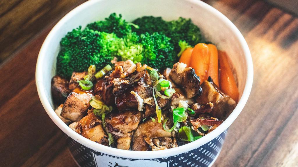 S04. Grilled Pork Chashu Don · Grilled chashu with green onion, fried onion and steamed veggies over rice.