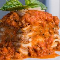 Mamma Carmela's Lasagna · Traditional veal & beef lasagna.