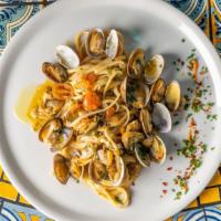 Linguine Alle Vongole · Manila clams in a white wine cherry tomato sauce.