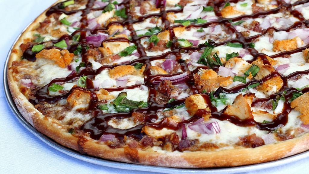 BBQ Chicken · BBQ sauce, roasted marinated chicken, bacon, green onions, red onions.