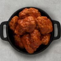Buffalo Hot Boneless Wings · Served with blue cheese or ranch.