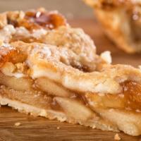 Dutch Apple Tart  · Butterfly short dough tart shell filled with sautéed apples, raisins, sliced almonds, topped...