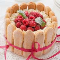 Raspberry Charlotte · Fresh white cake layered with raspberry jam and seedless raspberry cream filling garnished w...